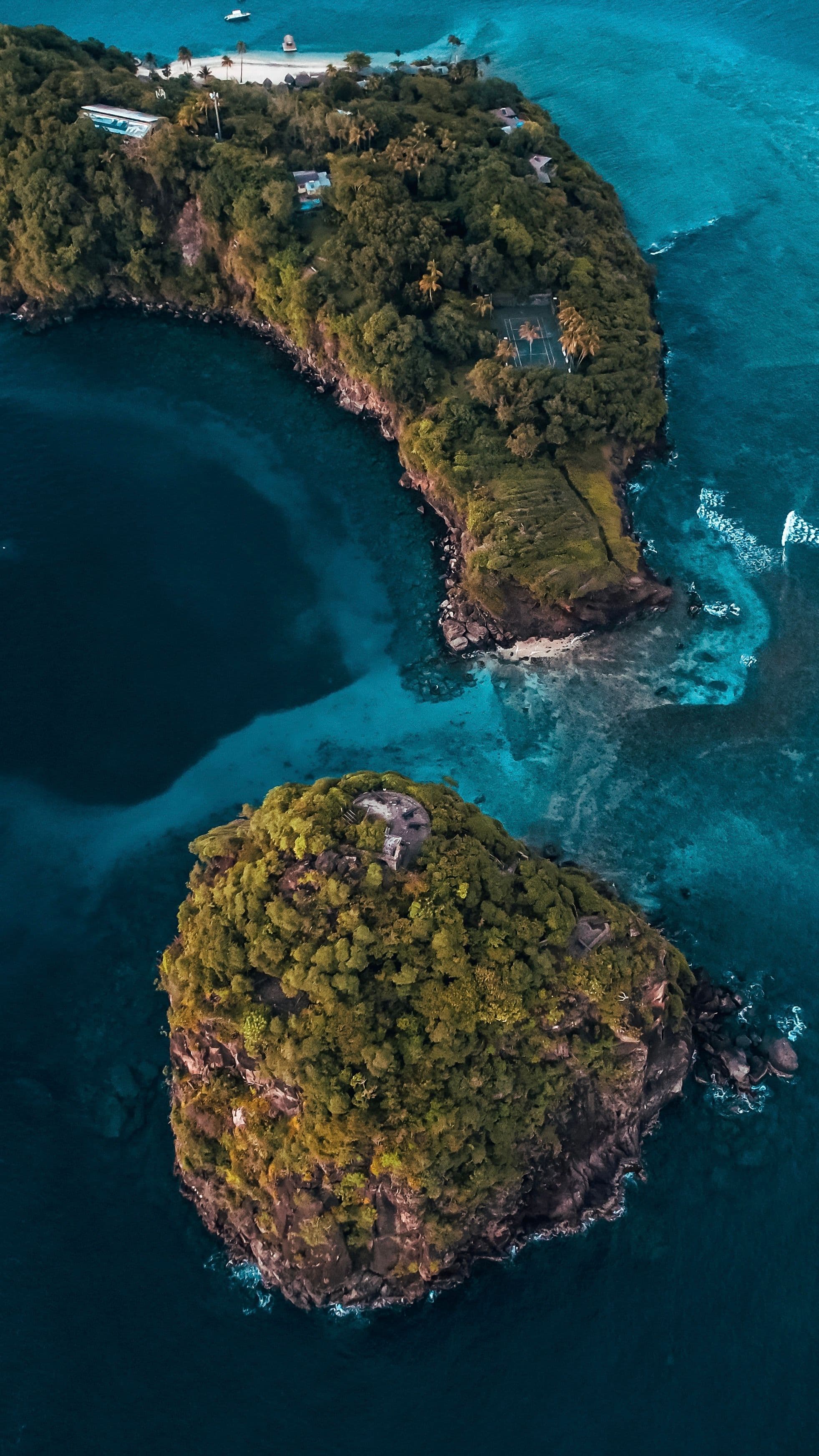 Aerial view of green headlands and turquoise water in Saint Vincent and the Grenadines